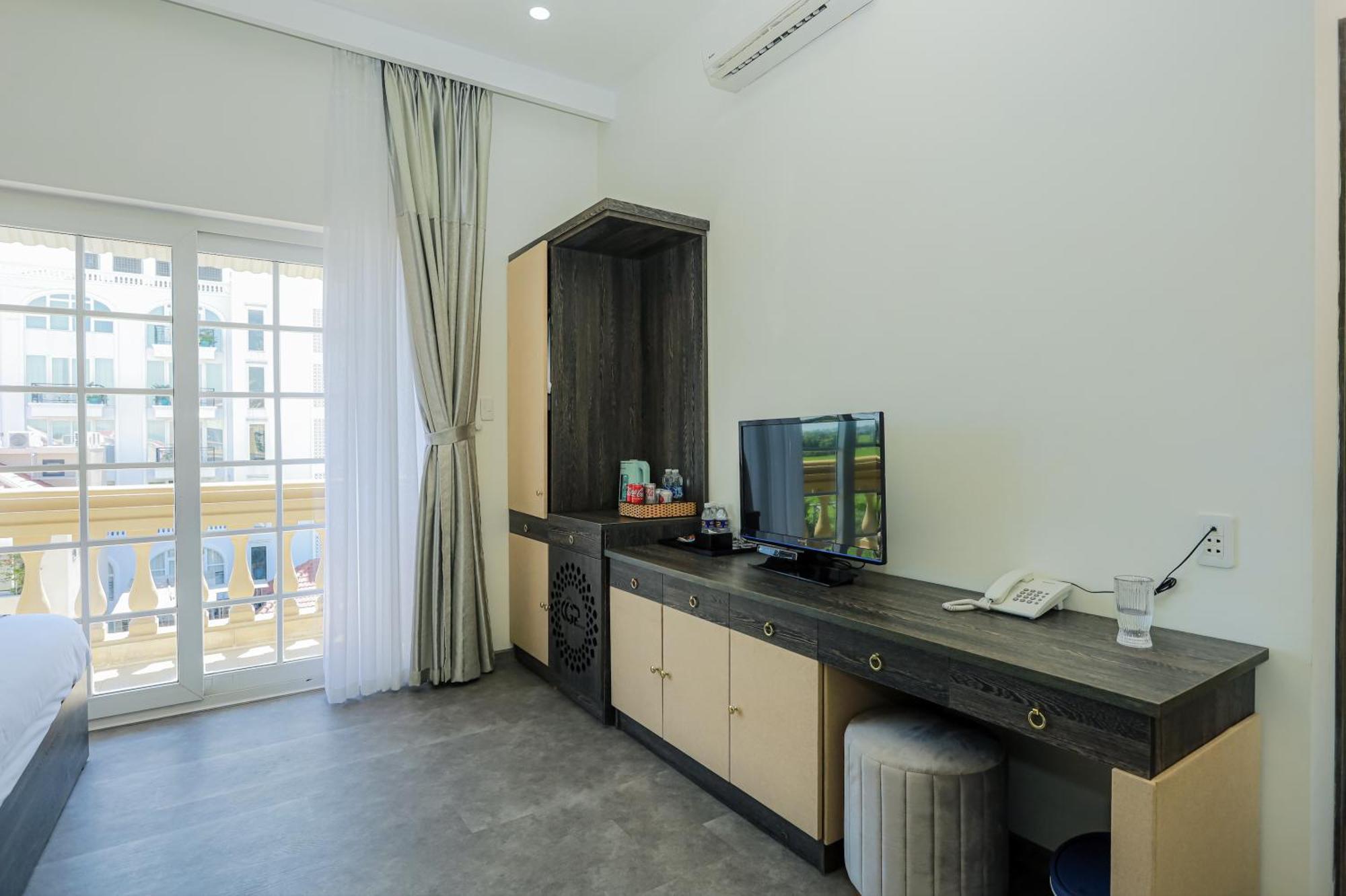 Premium Cgp Hotel Хойан Экстерьер фото
