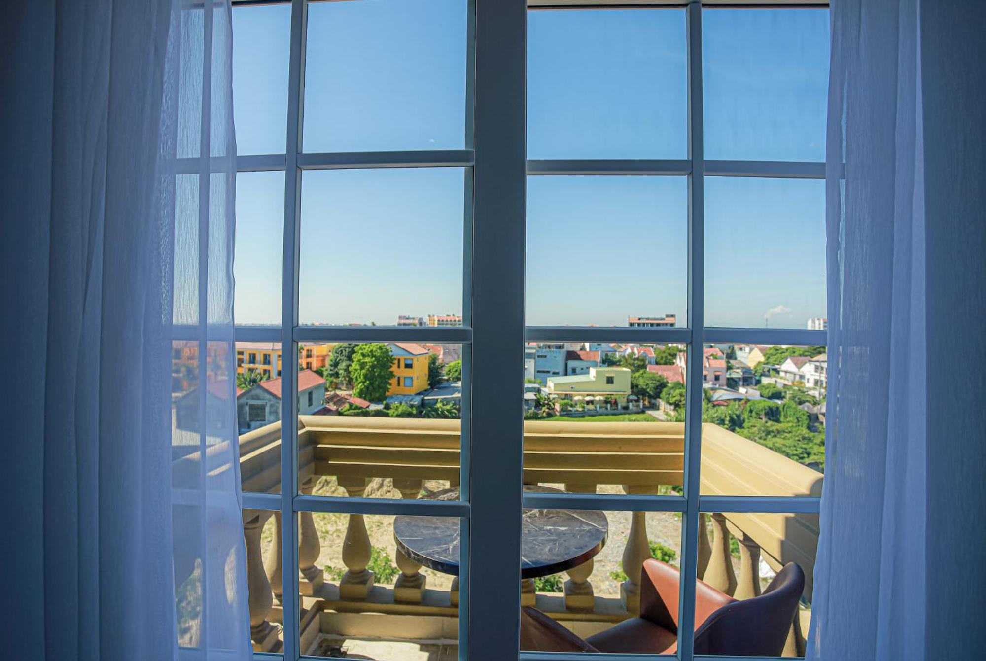 Premium Cgp Hotel Хойан Экстерьер фото